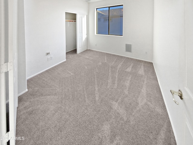 unfurnished bedroom with carpet