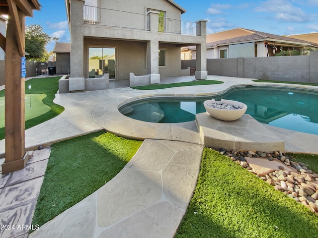 view of pool featuring a patio