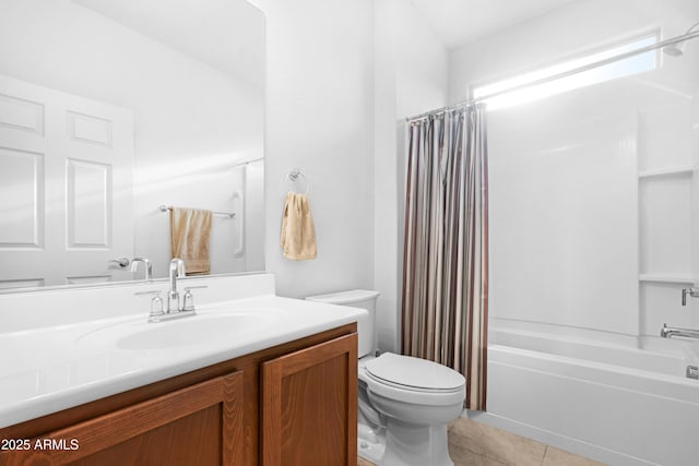 full bathroom featuring shower / tub combo, vanity, toilet, and tile patterned floors