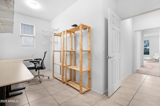 office area with light tile patterned floors