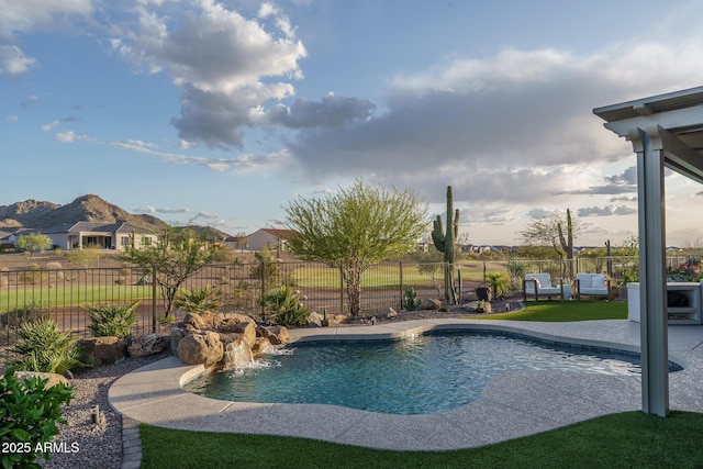 26673 W Ponderosa Ln, Buckeye, AZ 85396 - view of swimming pool featuring a mountain view, fence, and a patio