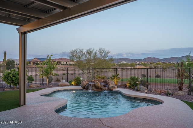 26673 W Ponderosa Ln, Buckeye, AZ 85396 - view of swimming pool with a mountain view and fence
