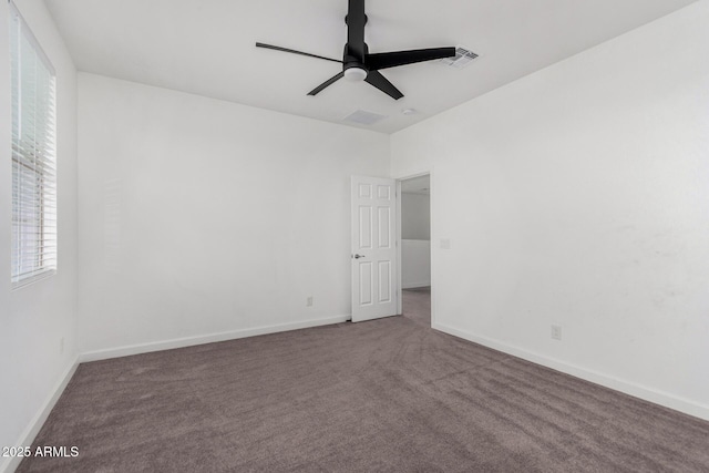 carpeted empty room with ceiling fan