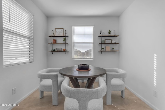 dining room featuring light tile patterned floors