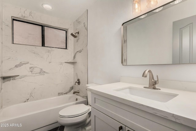 bathroom with toilet, bathtub / shower combination, and vanity