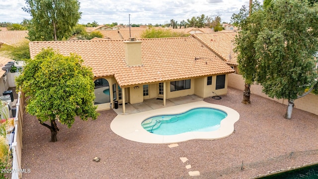 view of pool with a patio area and a fenced backyard