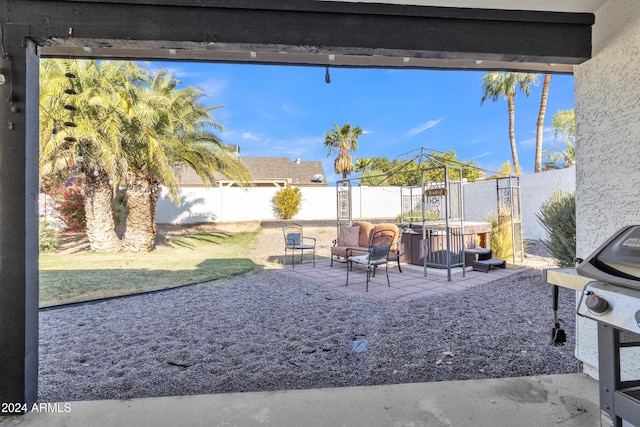 view of patio with a grill