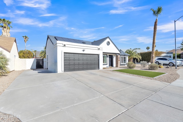 single story home with a garage