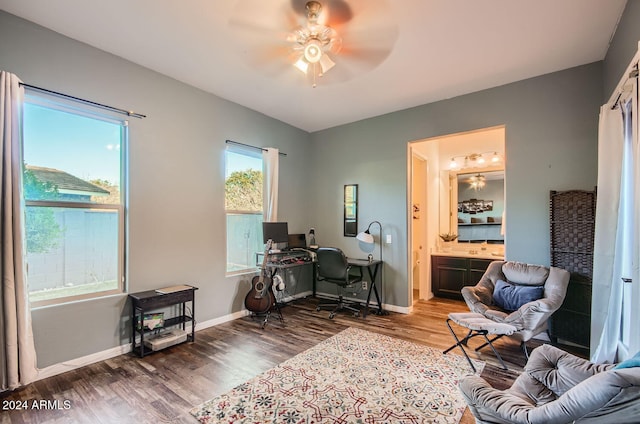 office area with hardwood / wood-style flooring and ceiling fan