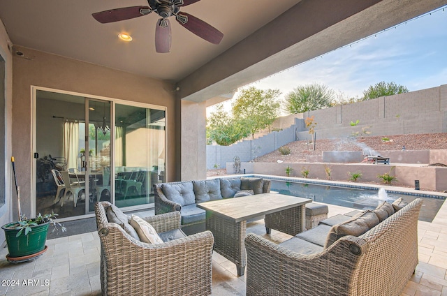 view of patio / terrace with ceiling fan, a fenced in pool, and an outdoor hangout area