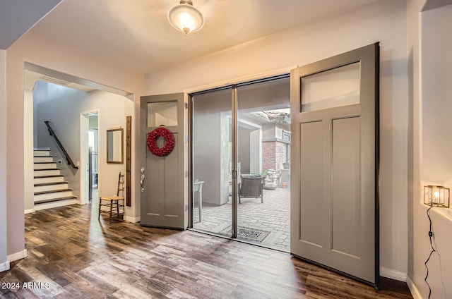 foyer entrance featuring hardwood / wood-style floors