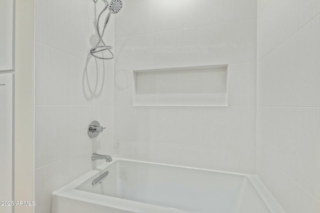 bathroom featuring shower / bath combination