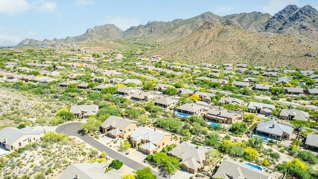 birds eye view of property with a residential view and a mountain view