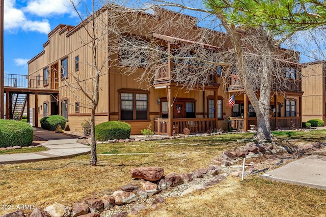 2361 Quarter Horse Trl Unit 232, Overgaard, AZ 85933 - view of building exterior featuring stairs
