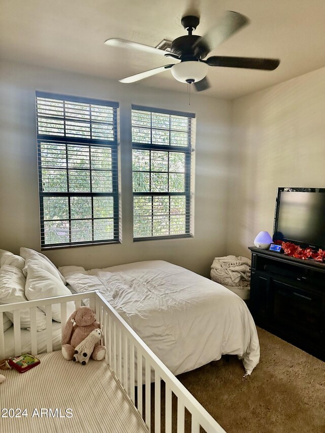2361 Quarter Horse Trl Unit 232, Overgaard, AZ 85933 - carpeted bedroom with a ceiling fan