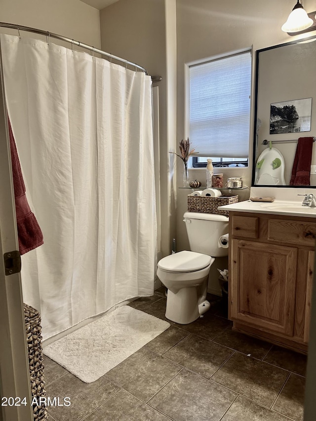 2361 Quarter Horse Trl Unit 232, Overgaard, AZ 85933 - full bathroom with stone finish flooring, a shower with shower curtain, vanity, and toilet