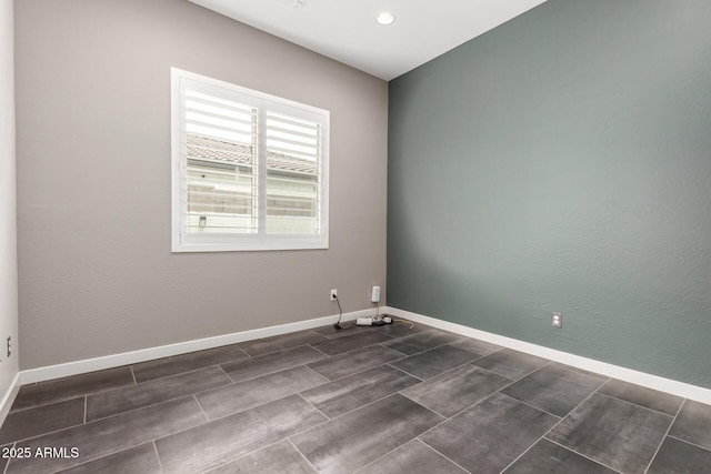 13850 W Weaver Ct, Litchfield Park, AZ 85340 - spare room featuring baseboards and recessed lighting