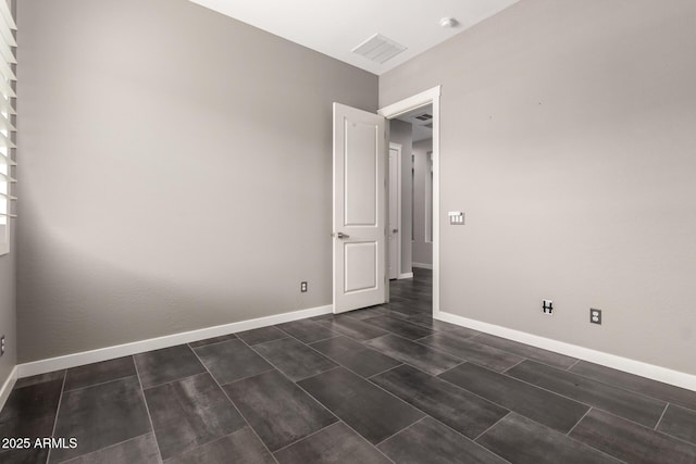 13850 W Weaver Ct, Litchfield Park, AZ 85340 - empty room with baseboards and a smoke detector