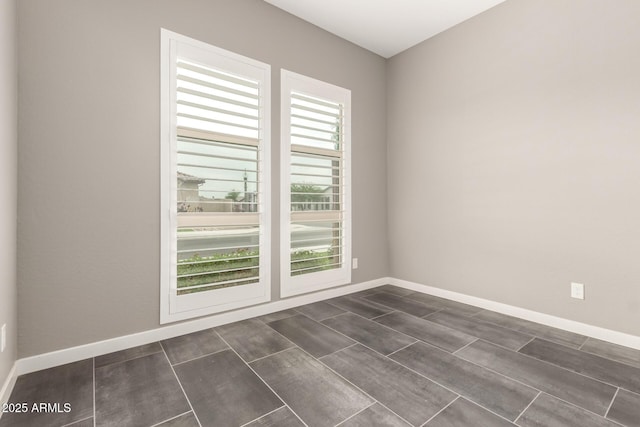 13850 W Weaver Ct, Litchfield Park, AZ 85340 - unfurnished room with baseboards