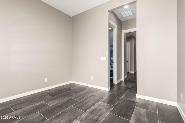 13850 W Weaver Ct, Litchfield Park, AZ 85340 - spare room featuring baseboards