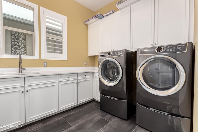 13850 W Weaver Ct, Litchfield Park, AZ 85340 - laundry room with cabinet space and washing machine and clothes dryer