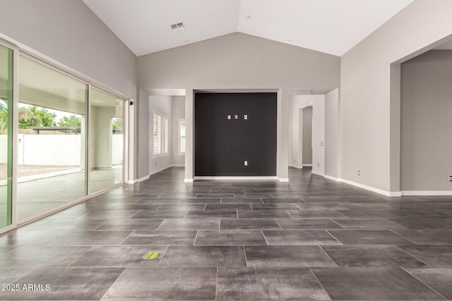 13850 W Weaver Ct, Litchfield Park, AZ 85340 - unfurnished living room featuring lofted ceiling