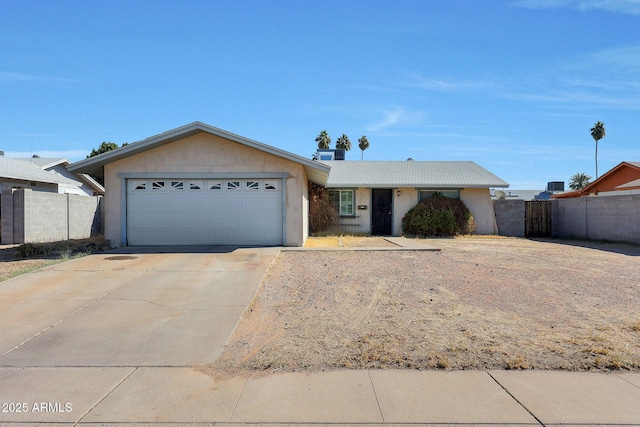 single story home featuring a garage