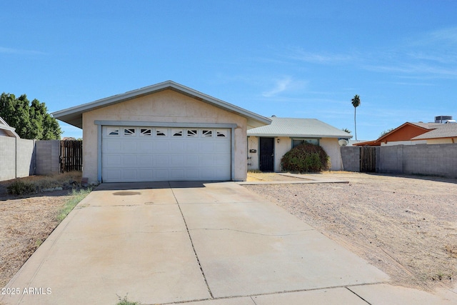 ranch-style home with a garage