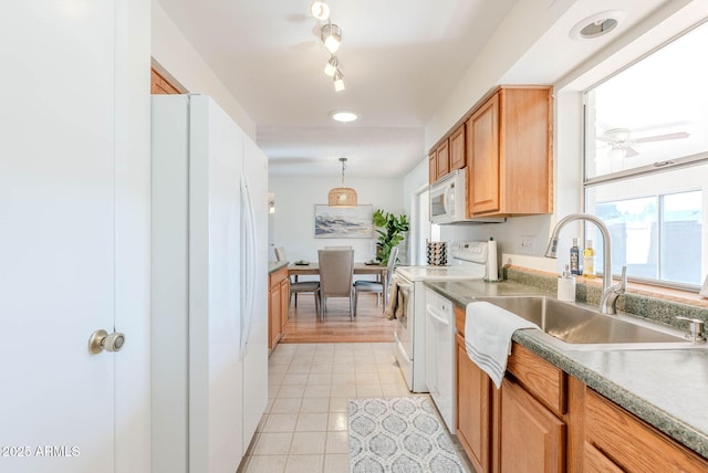 kitchen featuring ceiling fan, decorative light fixtures, white appliances, light tile patterned flooring, and sink