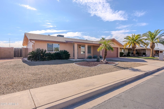 single story home featuring a garage