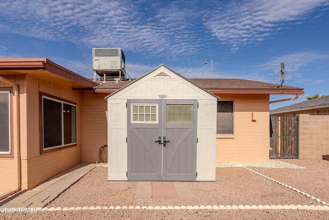 view of outbuilding featuring central AC unit