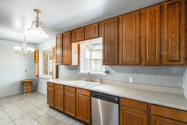 3001 N 21st Ave, Phoenix, AZ 85015 - kitchen with dishwasher, a sink, light countertops, and brown cabinets