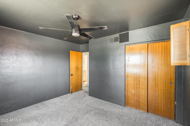 3001 N 21st Ave, Phoenix, AZ 85015 - unfurnished bedroom featuring carpet flooring, a closet, and a ceiling fan