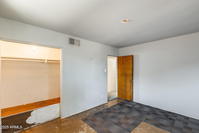 3001 N 21st Ave, Phoenix, AZ 85015 - unfurnished bedroom with a closet and concrete flooring