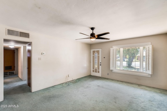 3001 N 21st Ave, Phoenix, AZ 85015 - carpeted spare room featuring a ceiling fan