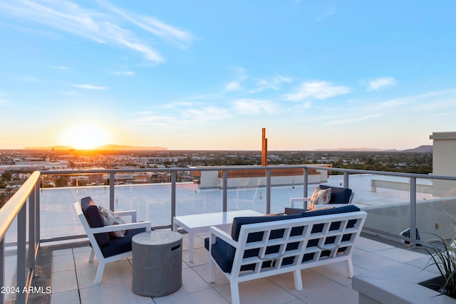 view of balcony at dusk