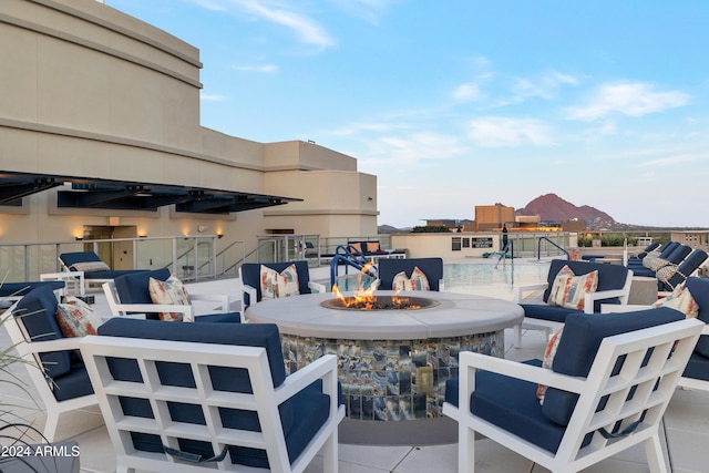 view of patio / terrace featuring a fire pit