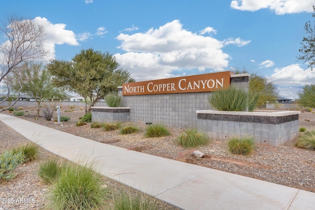 view of community sign