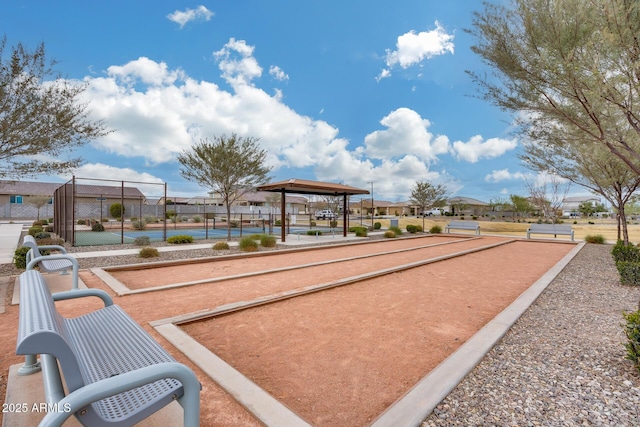 surrounding community featuring fence and a residential view