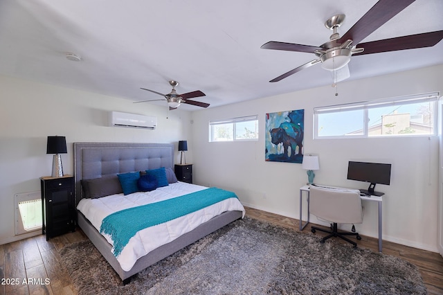 bedroom with radiator, ceiling fan, wood finished floors, and a wall mounted air conditioner