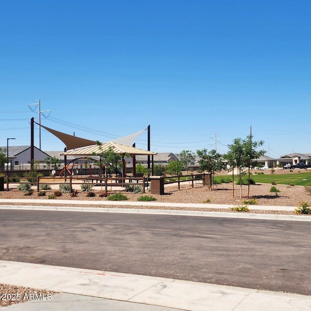 view of street featuring sidewalks and a residential view