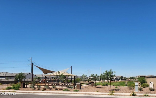 view of street featuring curbs, sidewalks, and a residential view