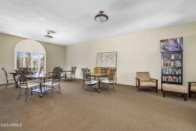 7512 N Via Camello Del Sur, Scottsdale, AZ 85258 - carpeted dining room featuring a textured wall