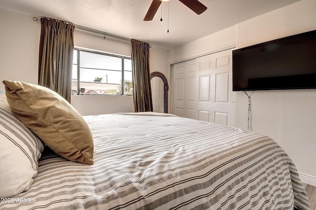 bedroom with a closet and ceiling fan