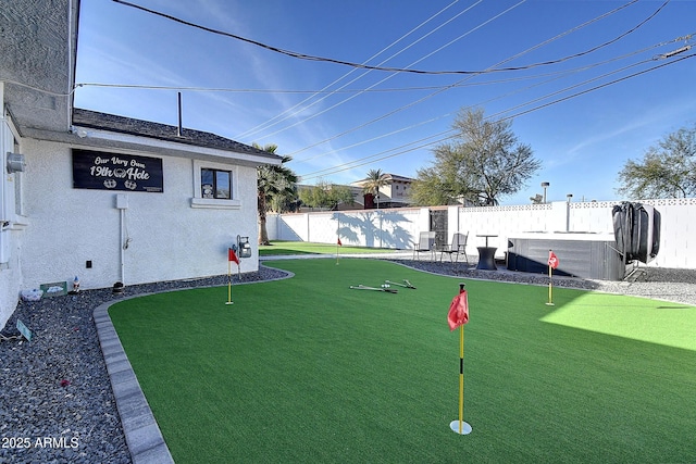 view of yard featuring central air condition unit and a fenced backyard