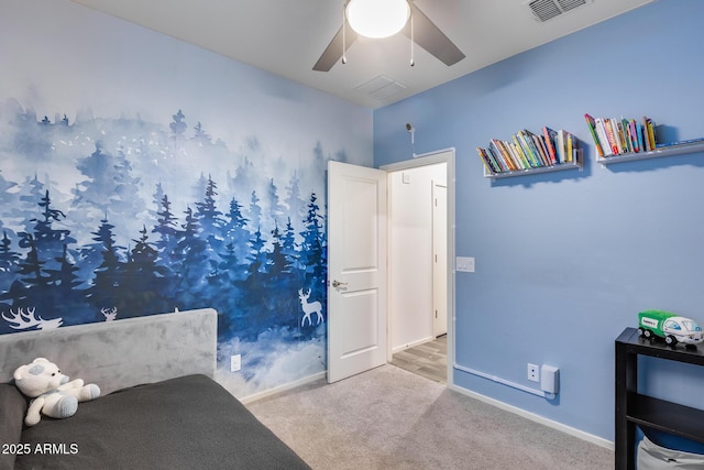 carpeted bedroom featuring ceiling fan