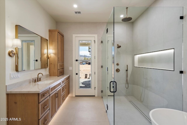 3323 N 81st St, Mesa, AZ 85207 - full bathroom with a shower stall, vanity, a soaking tub, tile patterned flooring, and recessed lighting