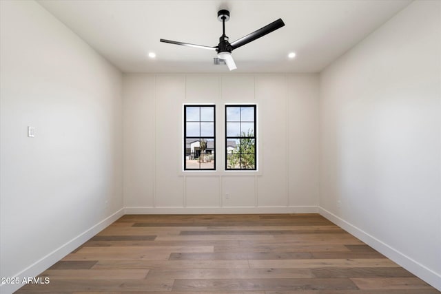 3323 N 81st St, Mesa, AZ 85207 - spare room with ceiling fan, light wood-style floors, recessed lighting, and baseboards