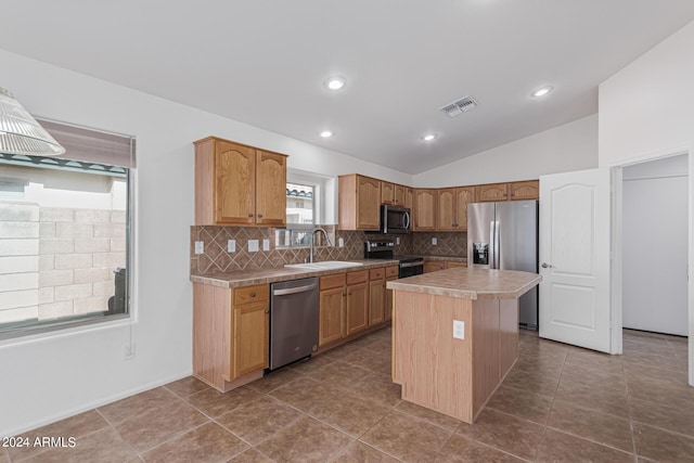 2268 S 162nd Ln, Goodyear, AZ 85338 - kitchen with tasteful backsplash, a sink, appliances with stainless steel finishes, visible vents, and light countertops