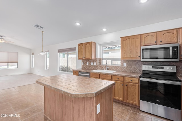 2268 S 162nd Ln, Goodyear, AZ 85338 - kitchen featuring a sink, ceiling fan, tasteful backsplash, visible vents, and appliances with stainless steel finishes